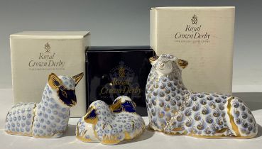 A Royal Crown Derby paperweight family group, comprising Sheep, Lamb and Twin lambs, gold