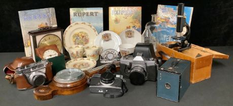 A Spindley & Hoyer student's microscope, cased; a Praktika MTL3 SLR camera; other cameras; a pair of