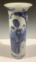 A late 19th century Chinese export ware cylindrical vase, painted in blue with courtly figures in