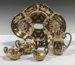 A Royal Crown Derby 6299 Imari pattern miniature four-piece tea service, on a 2451 pattern