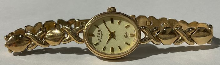 A lady's Rotary 9ct gold watch, oval dial, baton indicators, integral 9ct gold bracelet strap marked