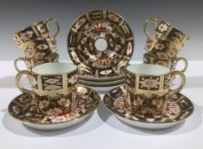 A set of six Royal Crown Derby 2451 Imari pattern coffee cans and saucers, early 20th century