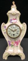 Clocks - A 19th century Royal Bonn floral porcelain cased mantle clock, the finial a gilded acanthus