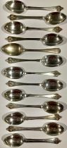 A set of twelve silver teaspoons, Sheffield 1921; another silver teaspoon, Sheffield 1919; 321g
