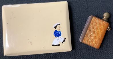 A 19th century miniature enamel and copper vesta case; an enamel compact decorated with two marching