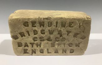 A Bridgwater bath brick "Genuine", England, 15cm wide