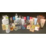 Fragrances and Lotions - a quantity of fragrances and lotions including Jimmy Choo, Coty, YSL,