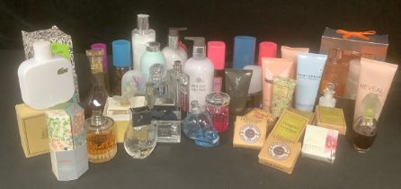 Fragrances and Lotions - a quantity of fragrances and lotions including Jimmy Choo, Coty, YSL,