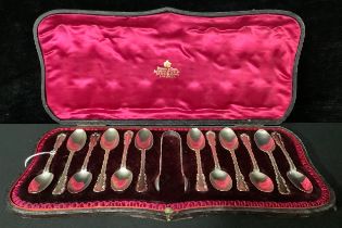 A set of six silver teaspoons, sugar bows en suite, George Jackson & David Fullerton, London 1902,