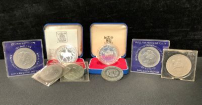 An Elizabeth II silver Silver Jubilee commemorative coin, boxed; another, boxed; six other cupro-