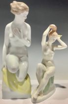 A Hungarian Hollohaza figure, female nude, 30cm, faults; another Hungarian porcelain smaller nude