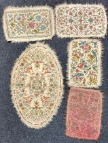 An Indian Namdha felt oval rug or carpet, embroidered with colourful threads with stylised sailing