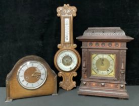 An early 20th century bracket style mantel clock, silvered dial, Roman numerals, twin winding holes;