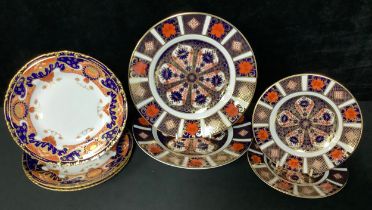 A pair of Royal Crown Derby 1128 pattern side plates, 2cm diameter; a pair of 1128 pattern tea