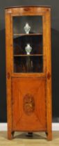 A Sheraton Revival satinwood and marquetry floor-standing bowfront corner display cabinet, moulded