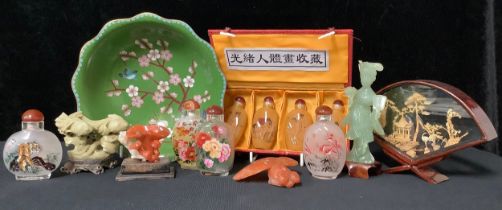 A Chinese reproduction reverse painted snuff bottle, decorated with a tiger, boxed; erotica - a