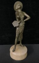 An Art Deco figure, of a Spanish dancer holding a tambourine, 27cm