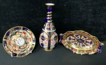 A Royal Crown Derby 1128 pattern slender bottle vase, 16cm year cypher for 1911; an 1128 shaped oval