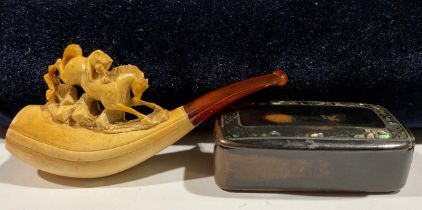 A meerschaum horse and lion cheroot holder; a papier-mâché snuff box, the border inlaid with