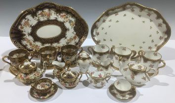 A Crown Staffordshire miniature tea service, comprising teapot, sucrier and cover, cream jug, cup