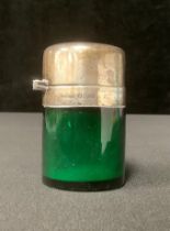 An Edwardian silver mounted green glass smelling salts bottle, Birmingham 1904