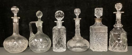 A silver mounted cut glass decanter, Birmingham 1975; other cut glass decanters (6)