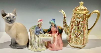 A Royal Doulton figure group, Afternoon Tea, HN1747; a Royal Copenhagen model, of a Siamese cat,