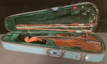 A violin, the two-piece back 36cm long excluding button, 37cm long overall; two bows apparently