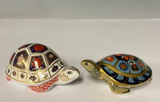 A Royal Crown Derby paperweight, Turtle, printed in the Imari 1128 pattern, gold stopper; another,