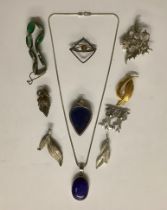 Jewellery - two lapis 925 silver plated pendants; a rolled gold brooch as two intertwining feathers;