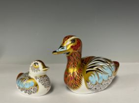 A pair of Royal Crown Derby paperweights, Duck and Duckling, Collector's Guild exclusives, gold