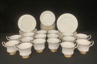 A Royal Albert Val D'Or pattern tea set, comprising fourteen cups and saucers, twelve tea plates,