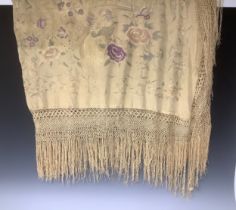 An early 20th century silk piano shawl, machine stitched with fanciful birds and butterflies perched