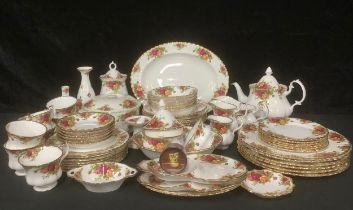 A Royal Albert Old Country Roses pattern dinner and tea service for six, comprising dinner plates,