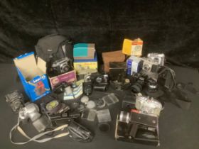 Cameras - a Lubitel 166U twin-lens reflex camera, with box; a Hanimex Compact A 35mm camera; a Canon