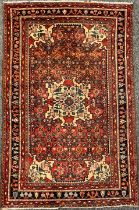 Middle East and the Orient - a Persian design Karadja type wool rug or carpet, 210cm x 133cm