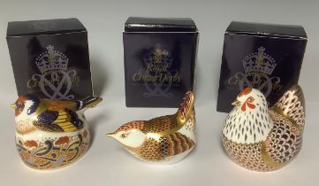 A Royal Crown Derby paperweight, Goldfinch Nesting, gold stopper, 6cm, printed mark, boxed; two