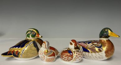 A Royal Crown Derby Duck paperweight, Mallard, gold stopper, printed mark; others, Carolina Duck,