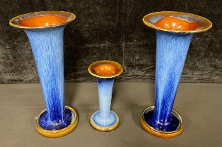 A pair of Denby Danesby Ware Electric Blue trumpet shaped vases, 26cm, another smaller, 15cm,