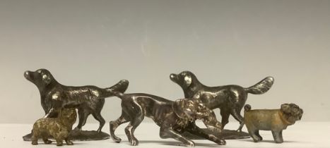 Two miniature Viennese cold painted dogs; a silvered dog with game; two silvered labradors (5)