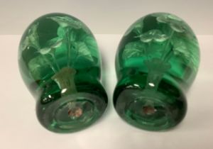 A pair of Victorian green glass dumps, each with Sulphur flower inclusions, 12cm, c, 1880