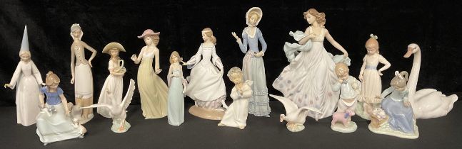 A Lladro figure group, Summer Serenade, 6193, 31.5cm; Cinderella, 6828, 26cm; others, similar (16)