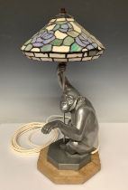 Boxes & Objects - Lights - a cast chimpanzee lamp, after Lawson Wood, with leaded Art Nouveau