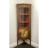 A Louis XV style gilt metal mounted mahogany serpentine corner vitrine, three-quarter glazed door