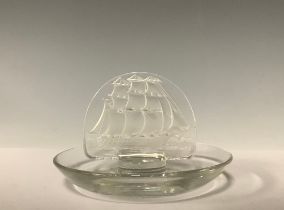 A Lalique Tall Ships pattern ring tray, applied with a frosted glass galleon motif, 10cm diameter,
