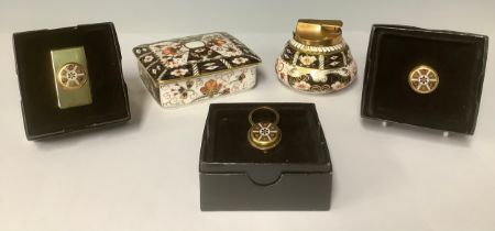 A Royal Crown Derby Imari palette 1128 pattern gilt metal money clip, pill box and keyring, each