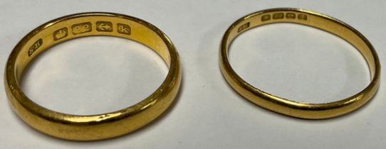 Gold Rings - a 22ct gold wedding band; another (2)