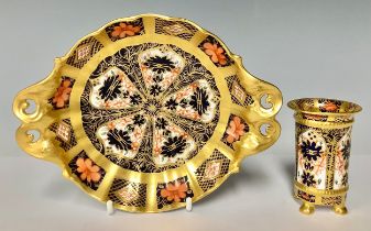 A Royal Crown Derby Imari 1128 pattern two handled pedestal bon-bon dish, solid gold band, first