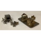 Boxes & Objects - an ornate steel Art Nouveau miniature sofa and crib; a miniature ox-drawn sled and