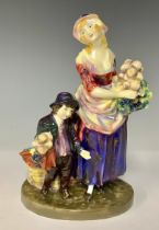 A Royal Doulton figure group, London Cry, HN752, printed and painted marks, 17cm high, c.1925